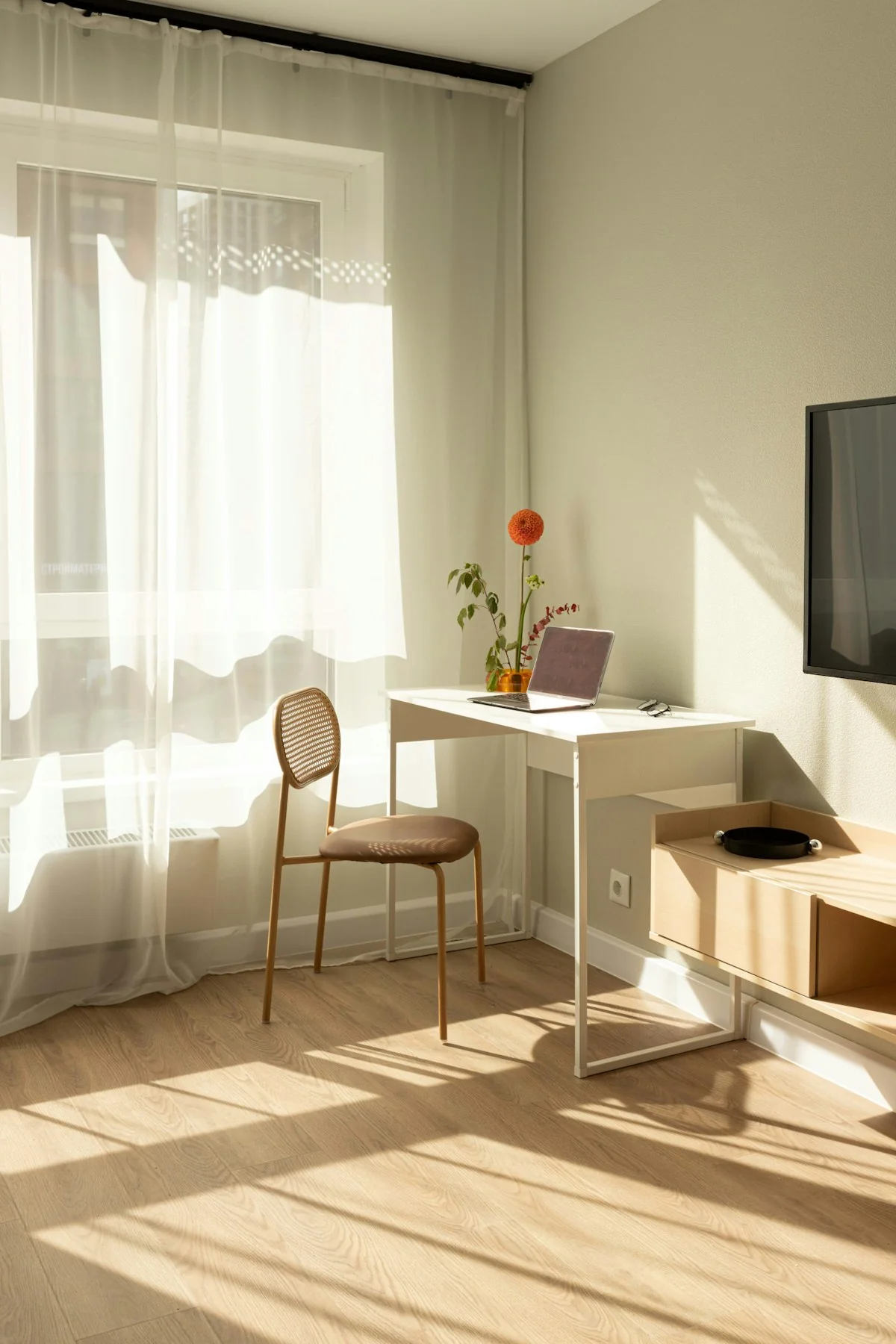 Minimal Workspace with Sunlit Desk